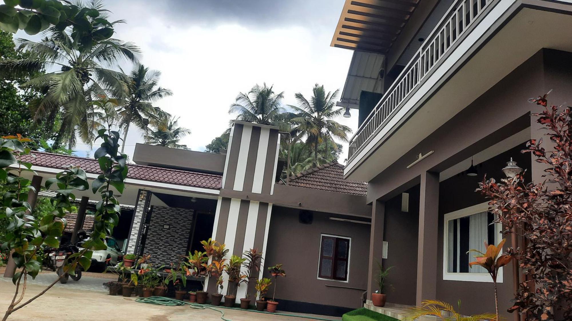 Linn View Home Stay Мунар Екстериор снимка